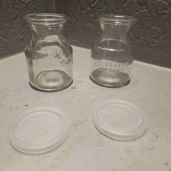 Crate & Barrel Creamery Clear Glass Carafe Jar Lids 2oz 3-1/4" Set of 2 - Picture 4 of 5